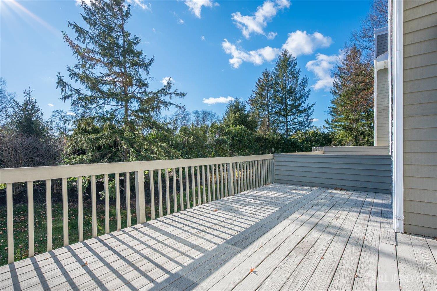 52 Springwood Court Princeton, NJ 08540 - Photo 34 of 34 a view of balcony with wooden floor and fence