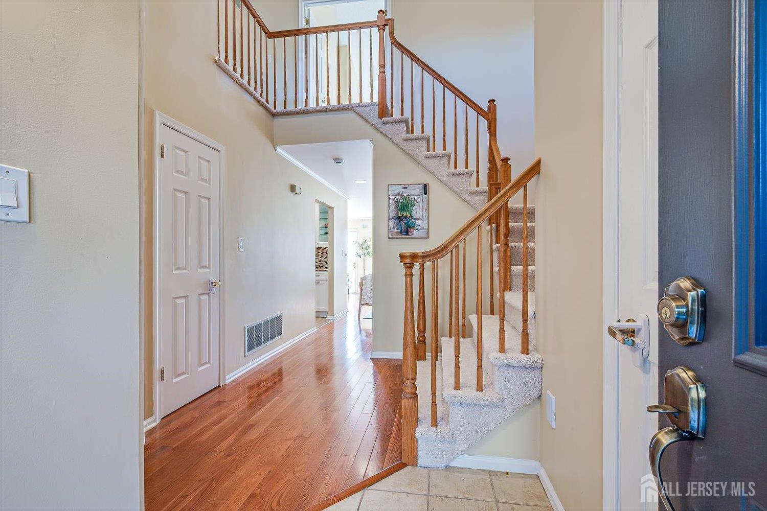 52 Springwood Court Princeton, NJ 08540 - Photo 4 of 34 a view of entryway with wooden floor