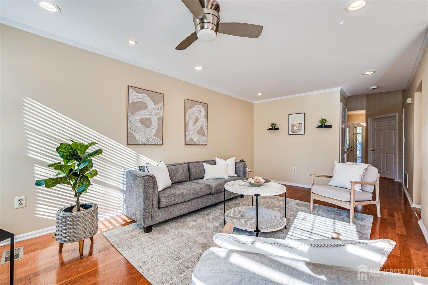 52 Springwood Court Princeton, NJ 08540 - Photo 7 of 34 a living room with furniture and wooden floor