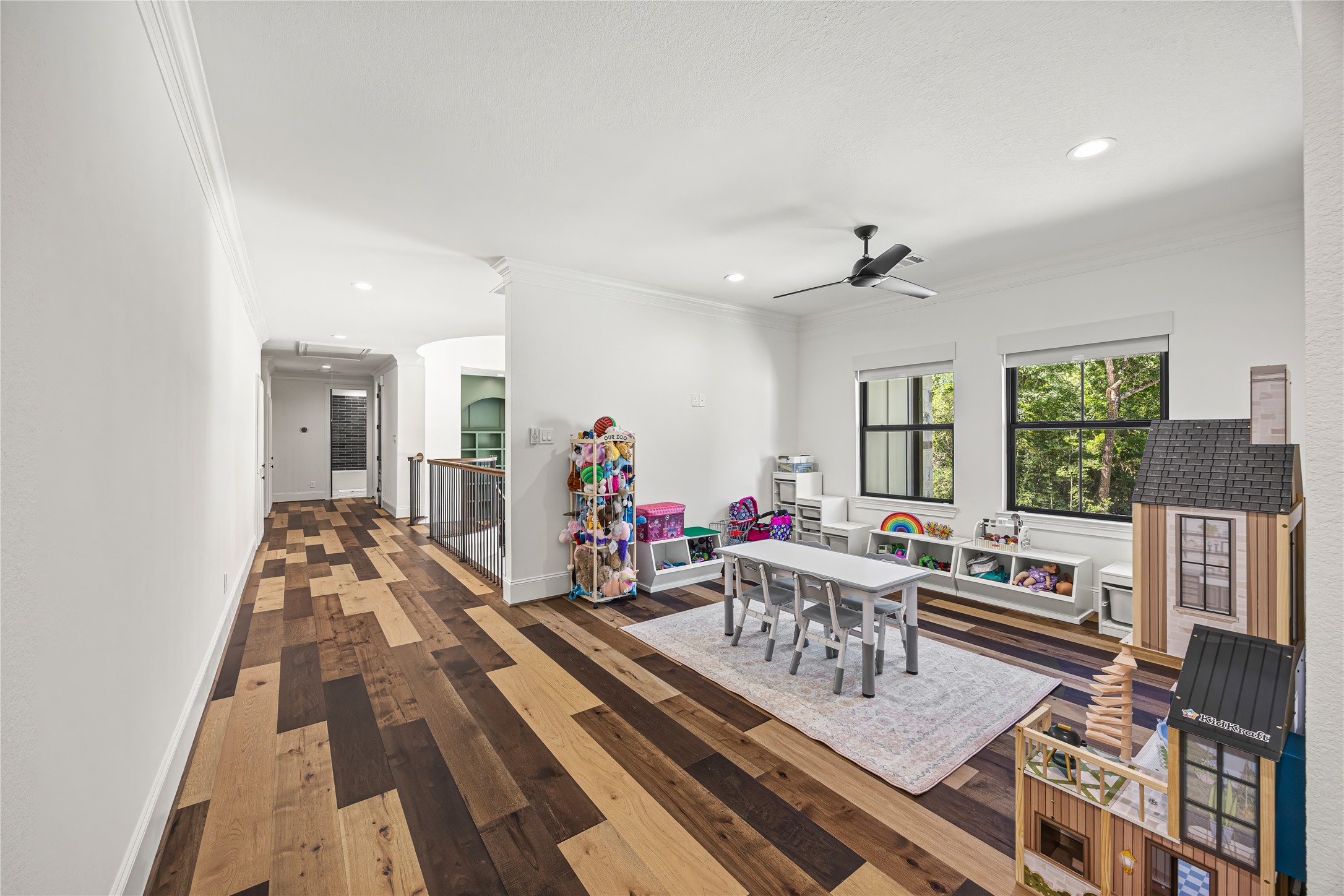 19314 Chateau Ridge Court Tomball, TX 77377 - Photo 28 of 50 Bright and spacious upstairs game room ideal for entertainment, family time, or kids’ play.