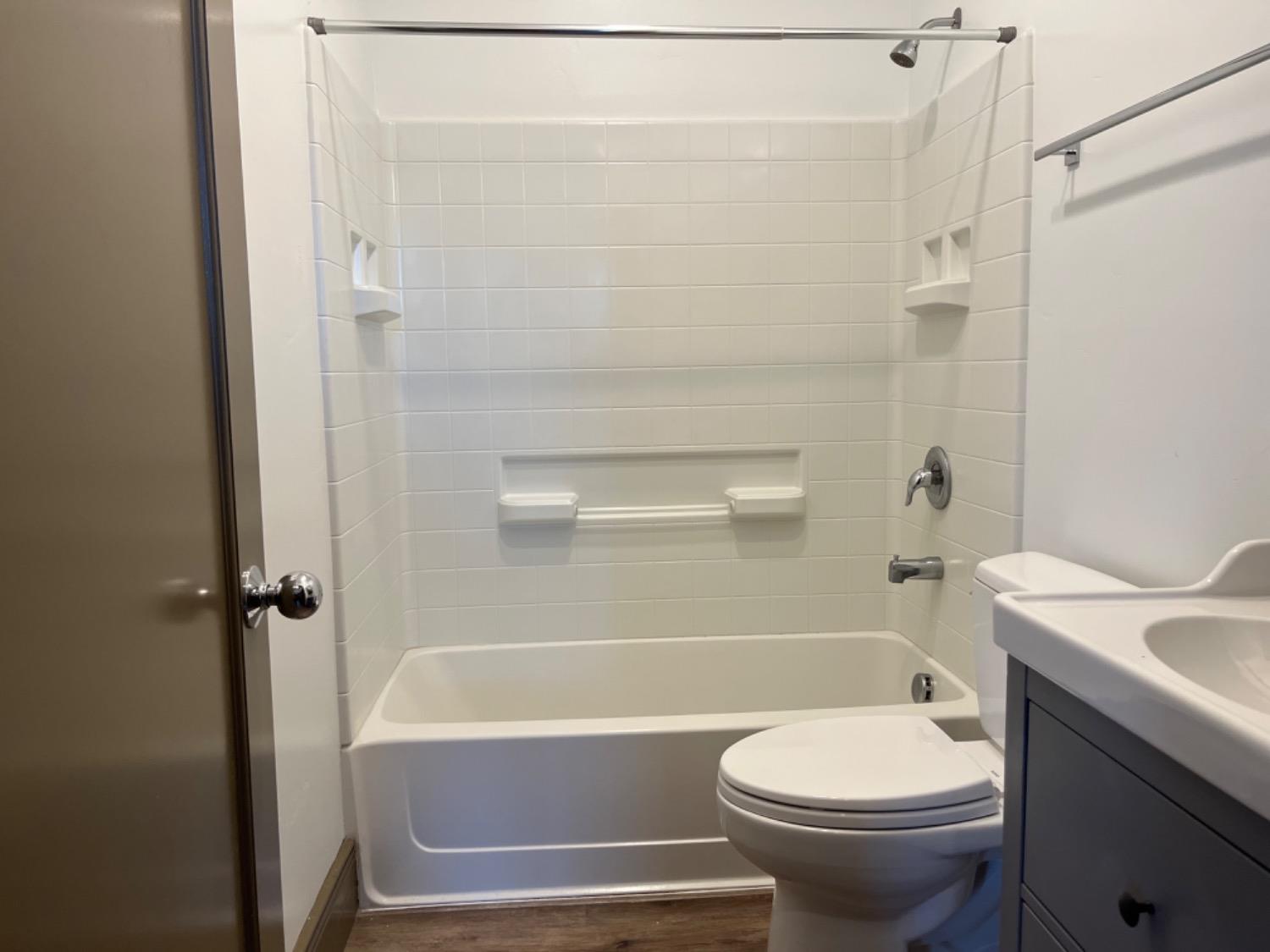 401 2nd Street, Unit 206 Woodland, CA 95695 - Photo 8 of 27 a bathroom with a sink and a toilet