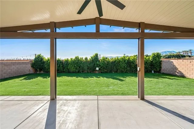 a view of a backyard of a house