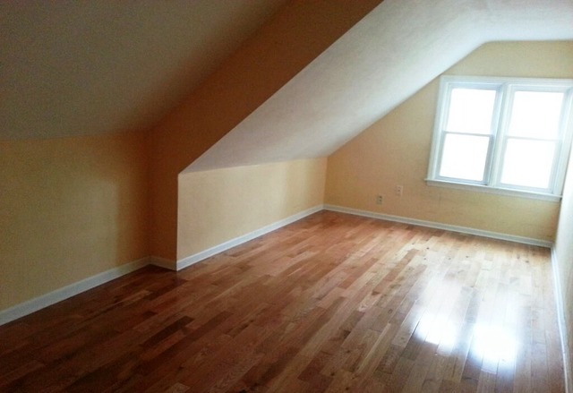 4305 Newburg Road Rockford, IL 61108 - Photo 9 of 11 an empty room with wooden floor and windows