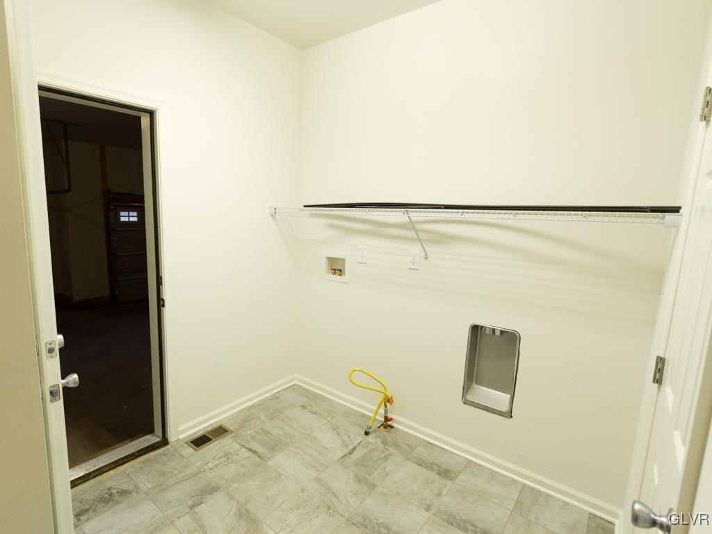 6559 Gun Club Road, Unit 35 Coopersburg, PA 18036 - Photo 23 of 48 a bathroom with a shower