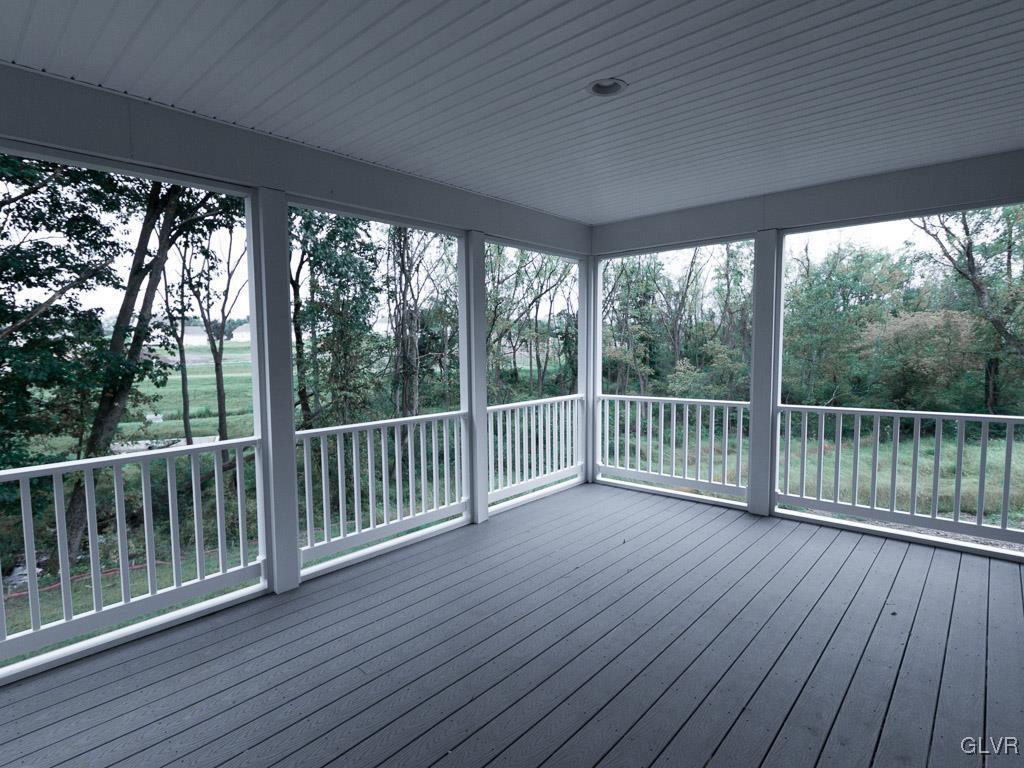 6559 Gun Club Road, Unit 35 Coopersburg, PA 18036 - Photo 25 of 48 a view of a balcony with wooden floor