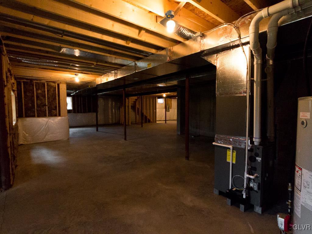 6559 Gun Club Road, Unit 35 Coopersburg, PA 18036 - Photo 46 of 48 a view of empty room with wooden floor