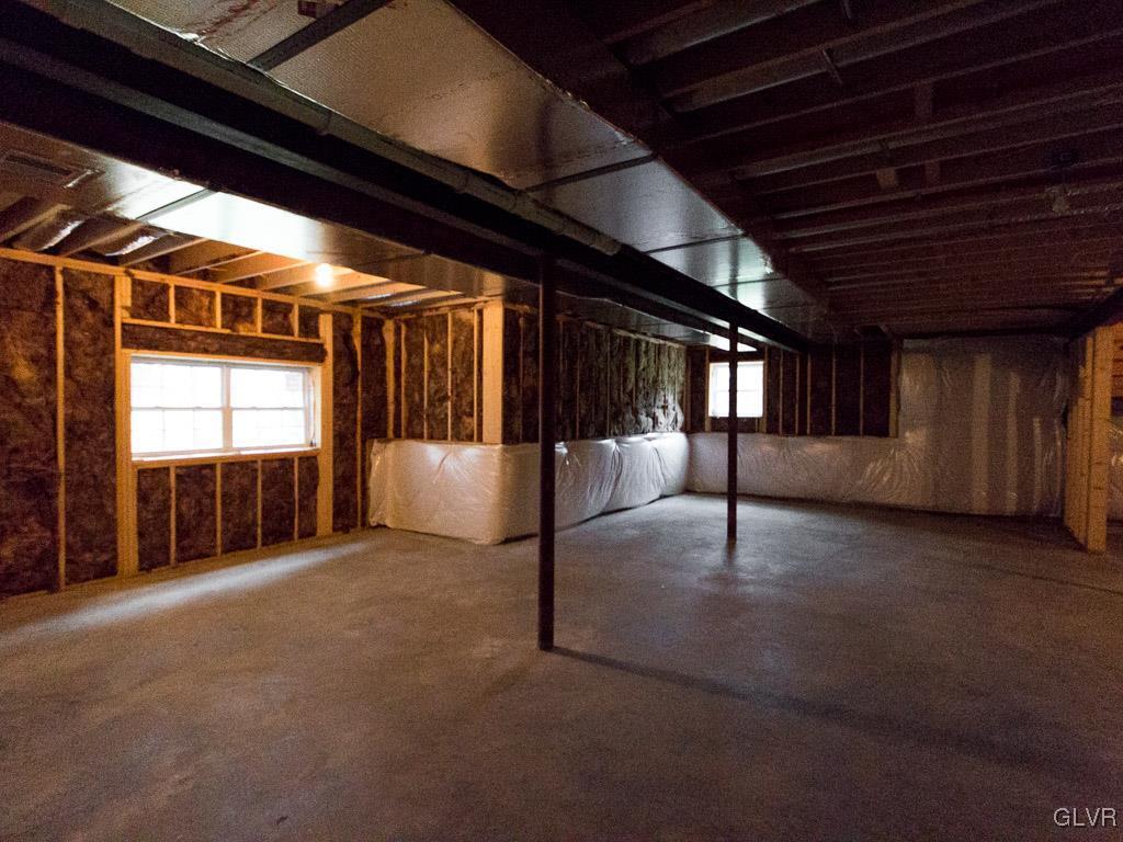 6559 Gun Club Road, Unit 35 Coopersburg, PA 18036 - Photo 47 of 48 a view of an empty room with a fireplace