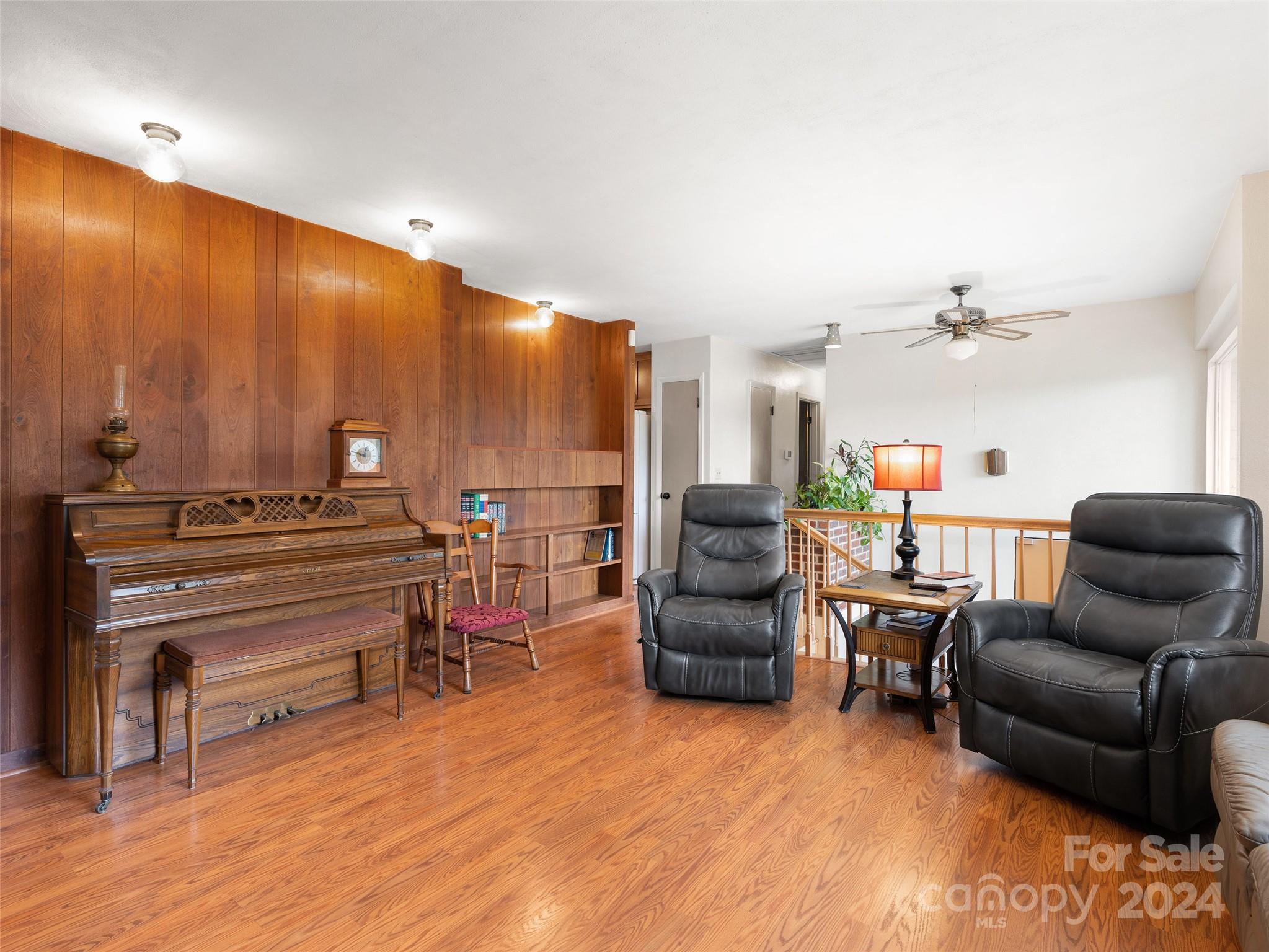 2599 Thickety Road Clyde, NC 28721 - Photo 13 of 30 a living room with furniture and a flat screen tv