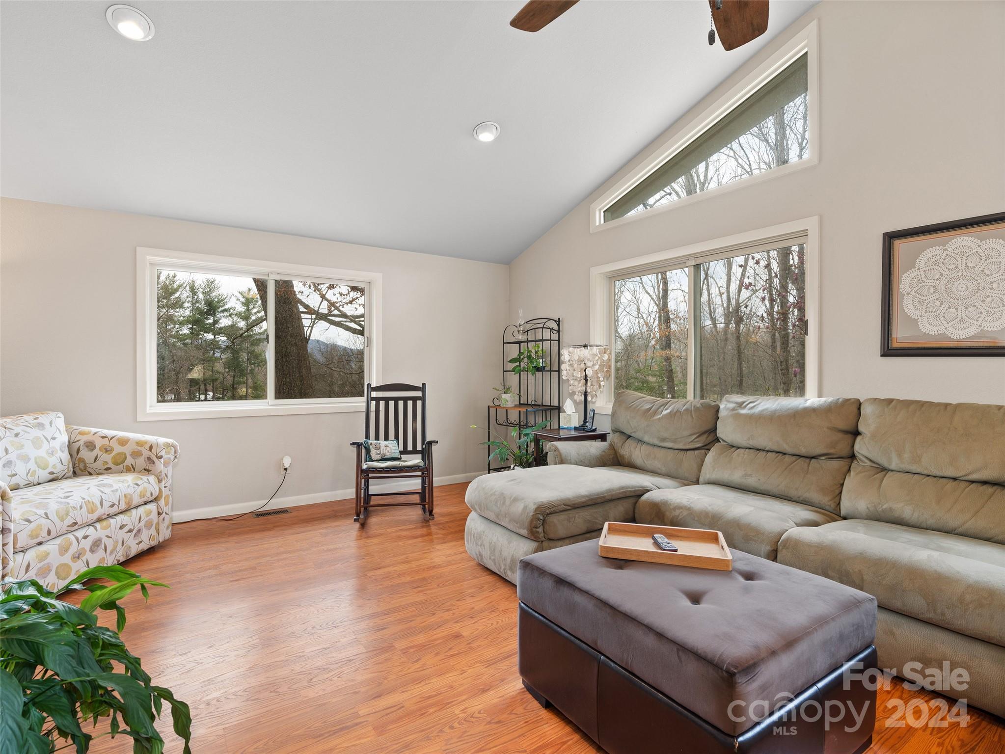 2599 Thickety Road Clyde, NC 28721 - Photo 4 of 30 a living room with furniture and a large window