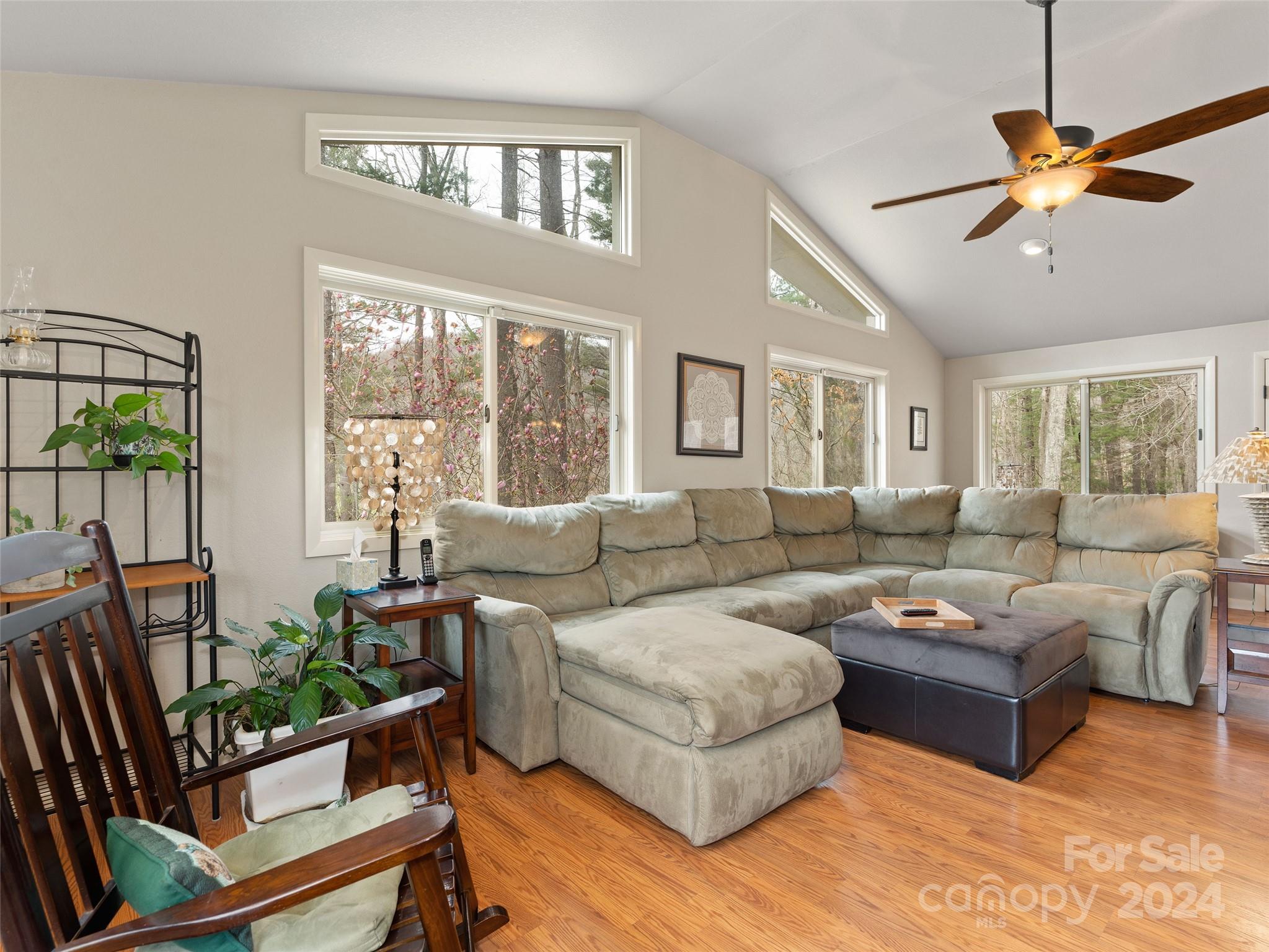 2599 Thickety Road Clyde, NC 28721 - Photo 5 of 30 a living room with furniture and a large window