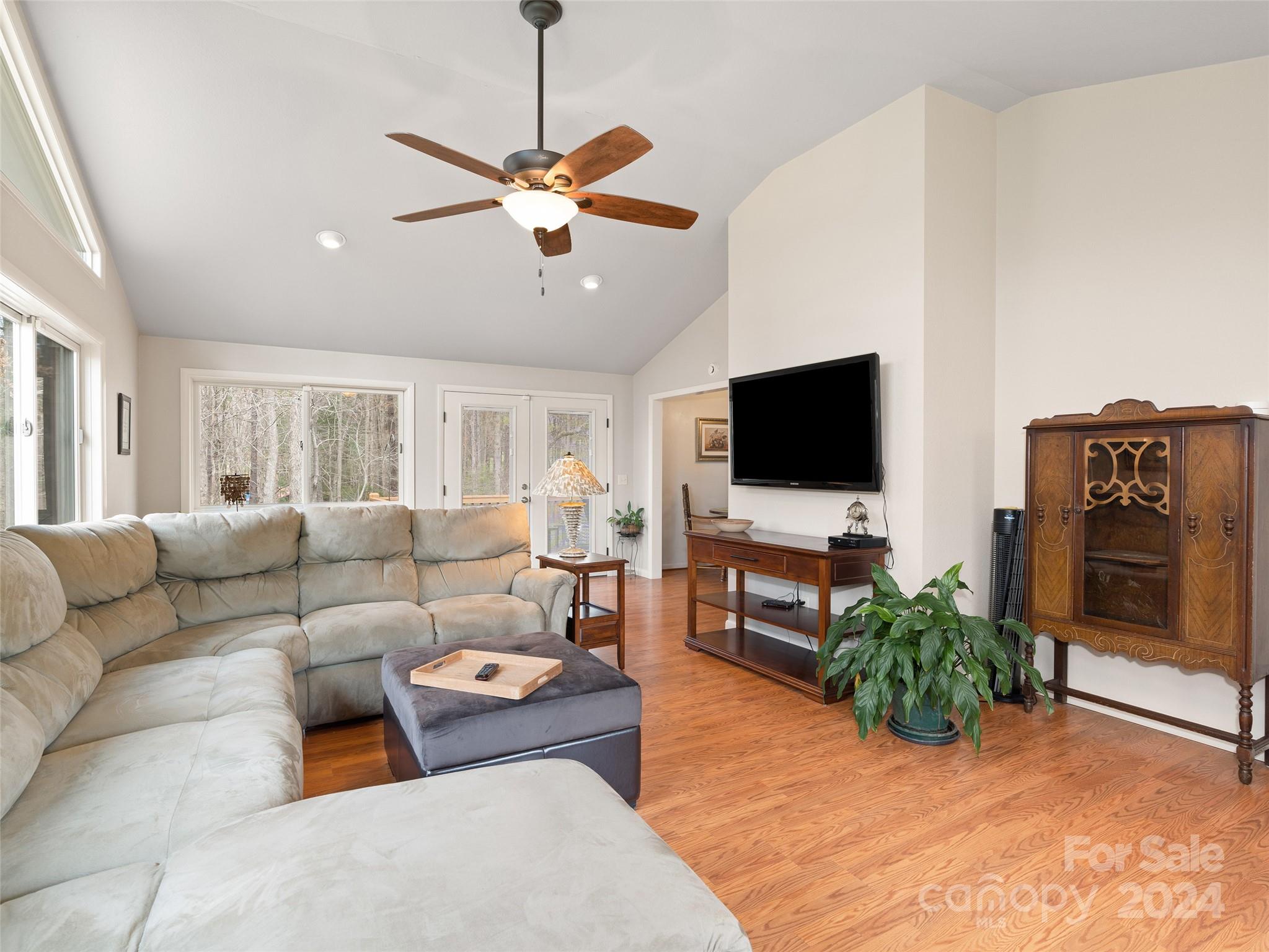 2599 Thickety Road Clyde, NC 28721 - Photo 7 of 30 a living room with furniture and a flat screen tv