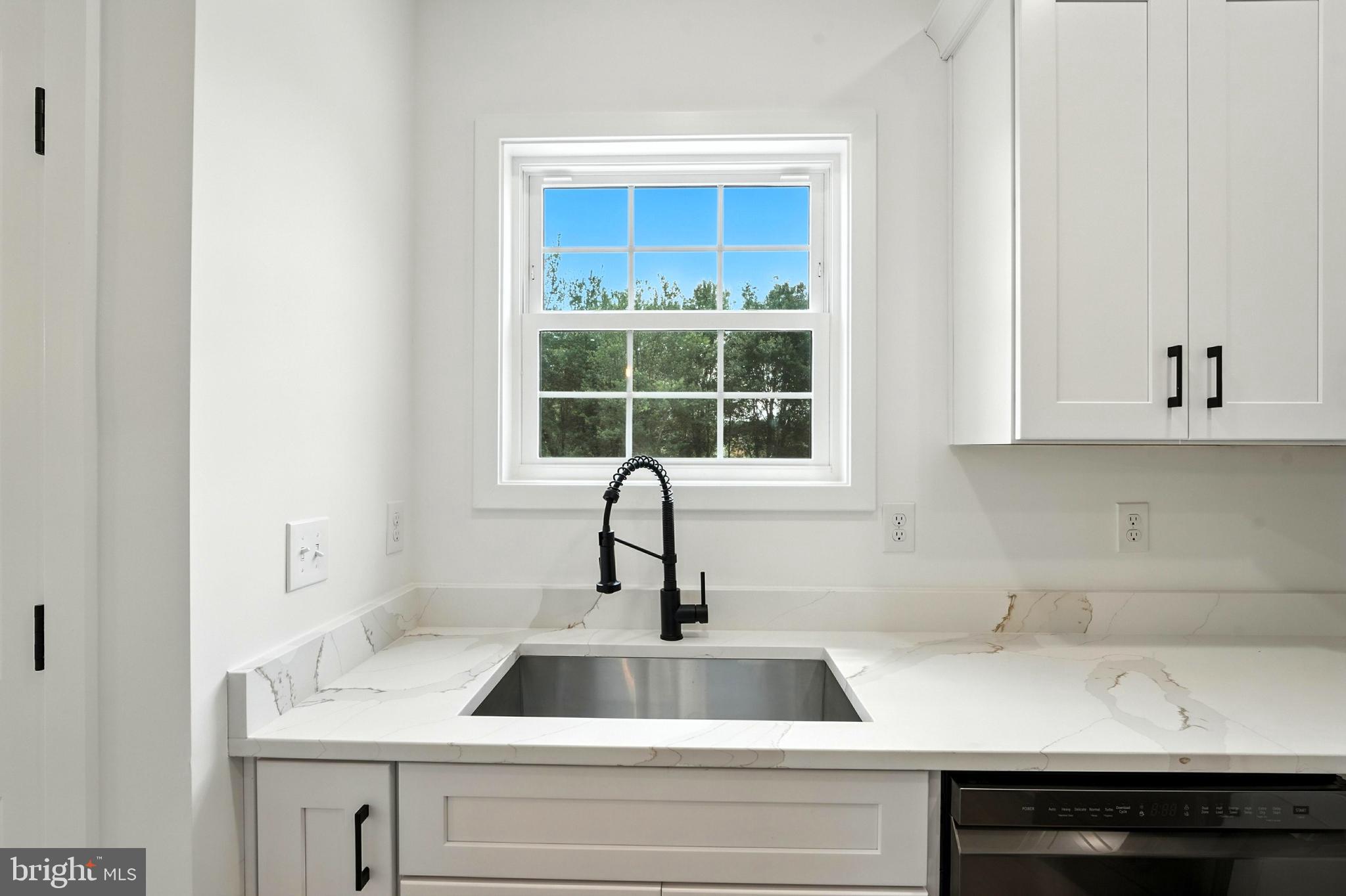 10446 Cherry Hill Road Culpeper, VA 22701 - Photo 12 of 53 a kitchen with a sink and cabinets