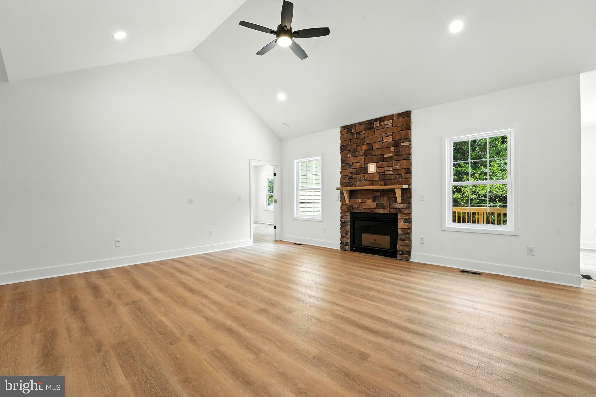 10446 Cherry Hill Road Culpeper, VA 22701 - Photo 17 of 53 wooden floor in an empty room with a window