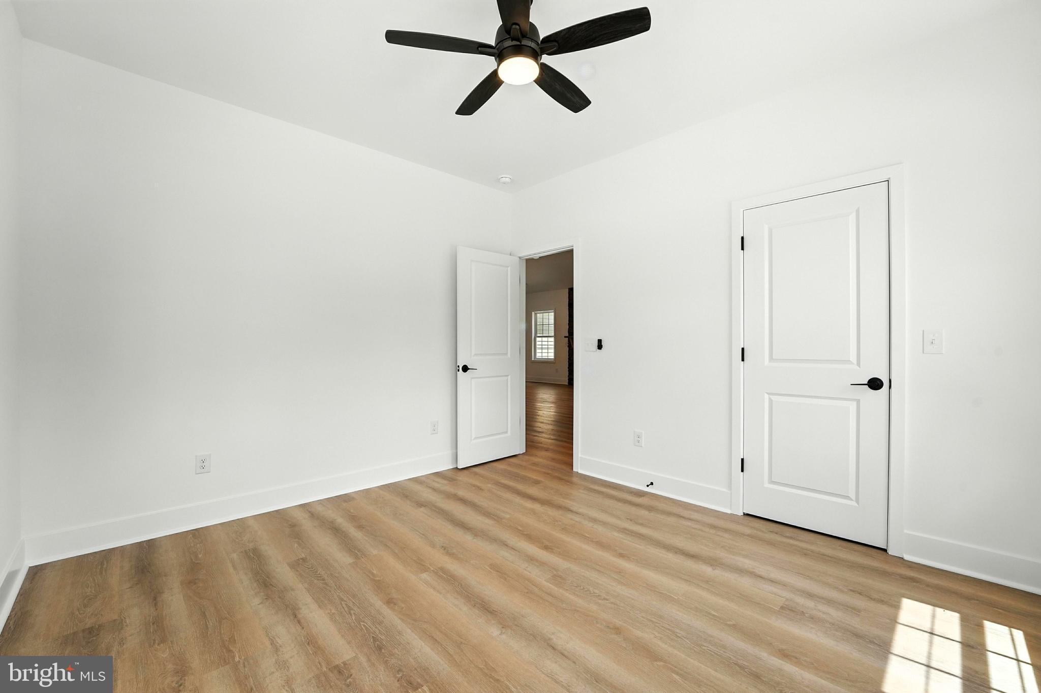 10446 Cherry Hill Road Culpeper, VA 22701 - Photo 28 of 53 a view of empty room with ceiling fan