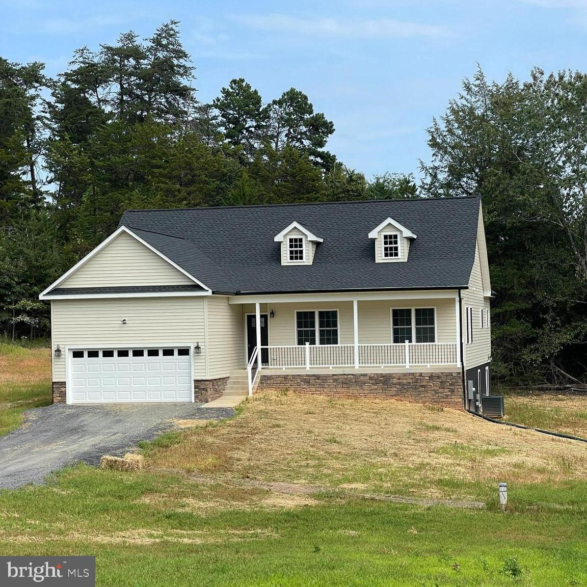 10446 Cherry Hill Road Culpeper, VA 22701 - Photo 3 of 53 a front view of a house with a yard