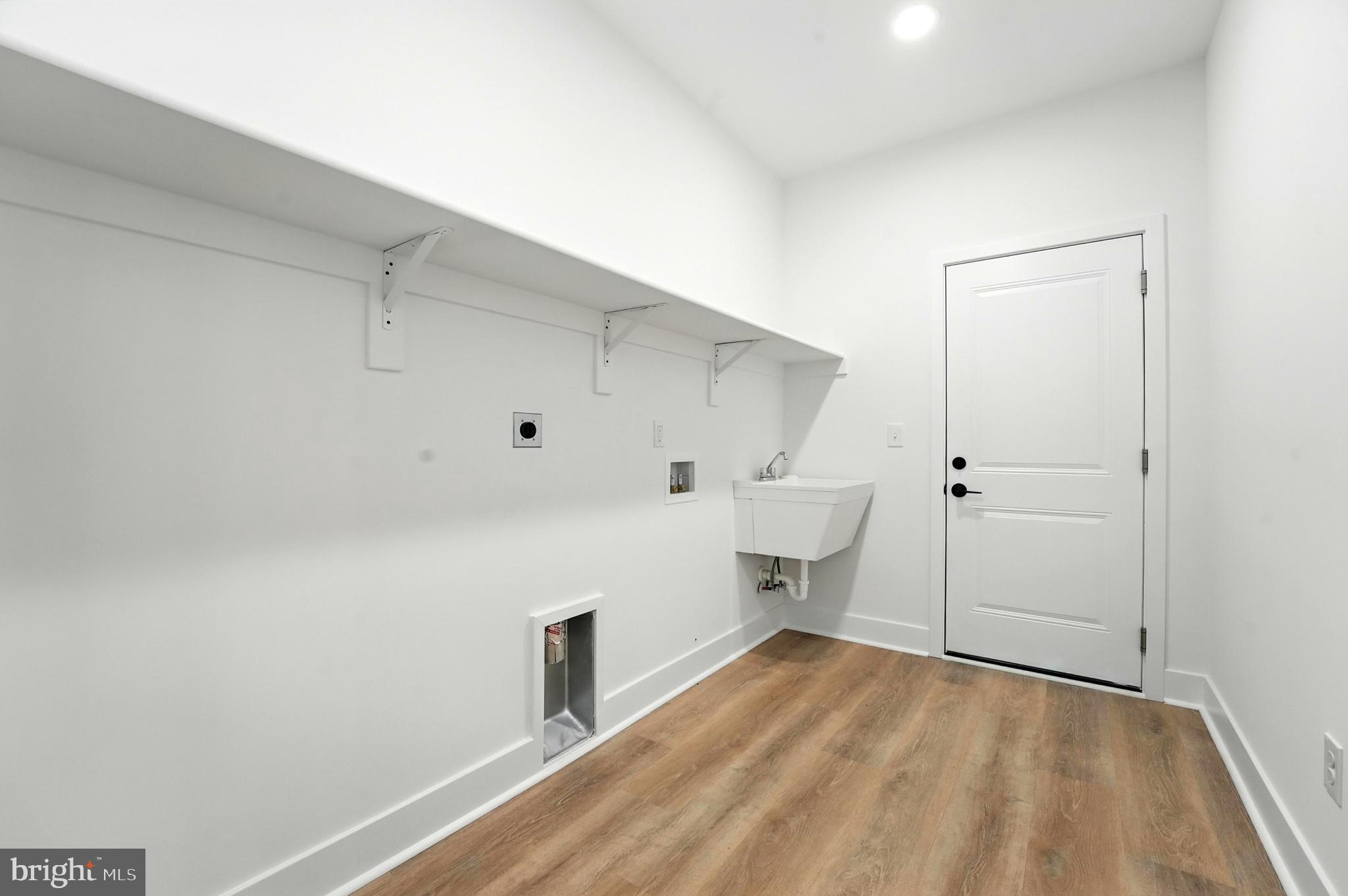 10446 Cherry Hill Road Culpeper, VA 22701 - Photo 37 of 53 a view of storage and utility room with wooden floor