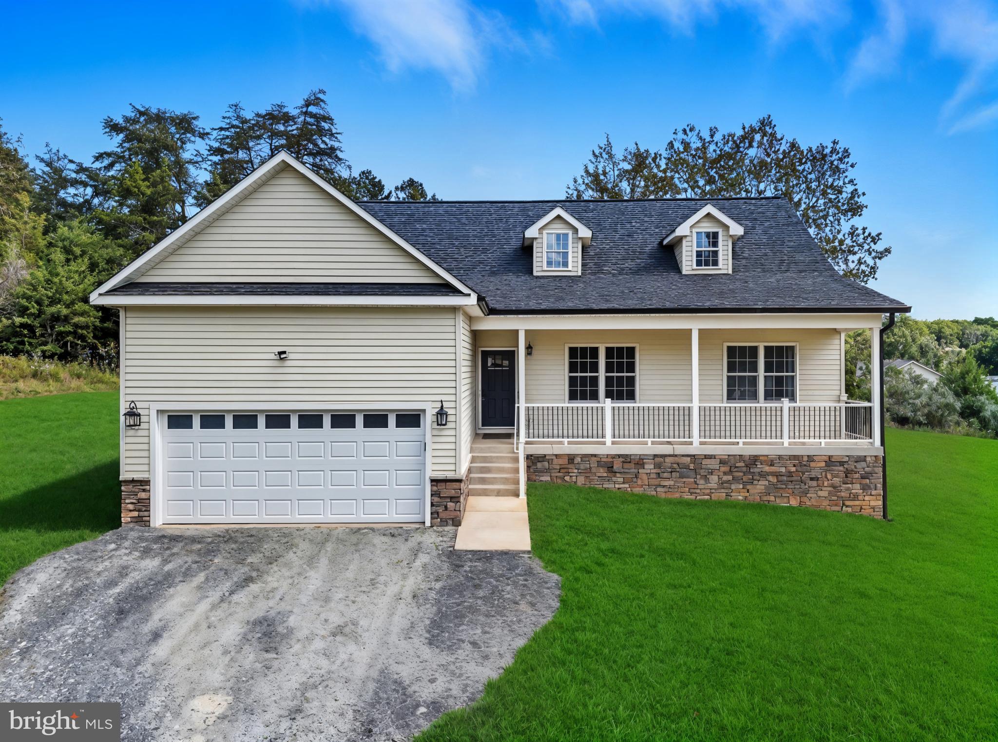 10446 Cherry Hill Road Culpeper, VA 22701 - Photo 46 of 53 a front view of a house with a yard