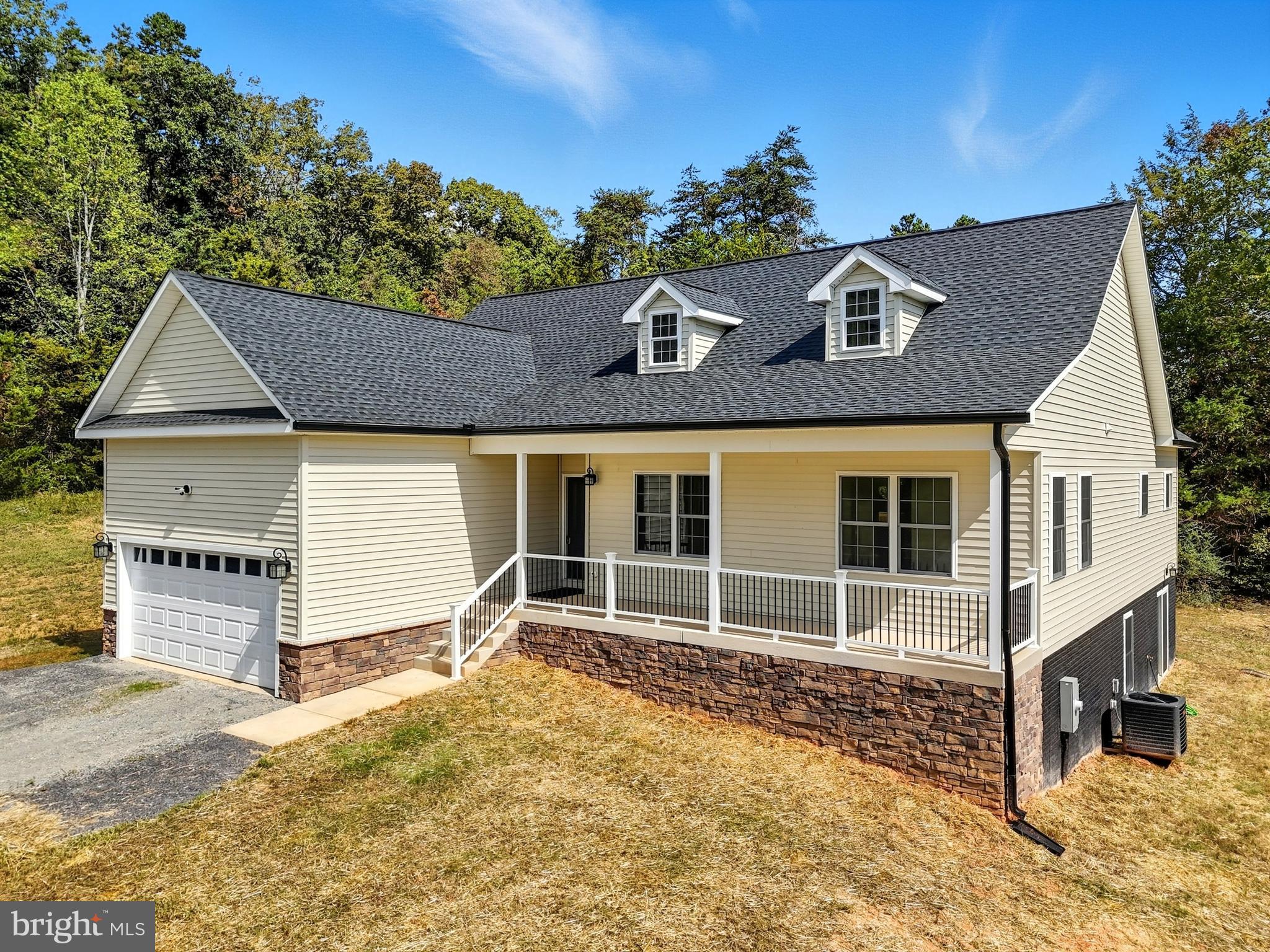 10446 Cherry Hill Road Culpeper, VA 22701 - Photo 48 of 53 a front view of a house with a yard