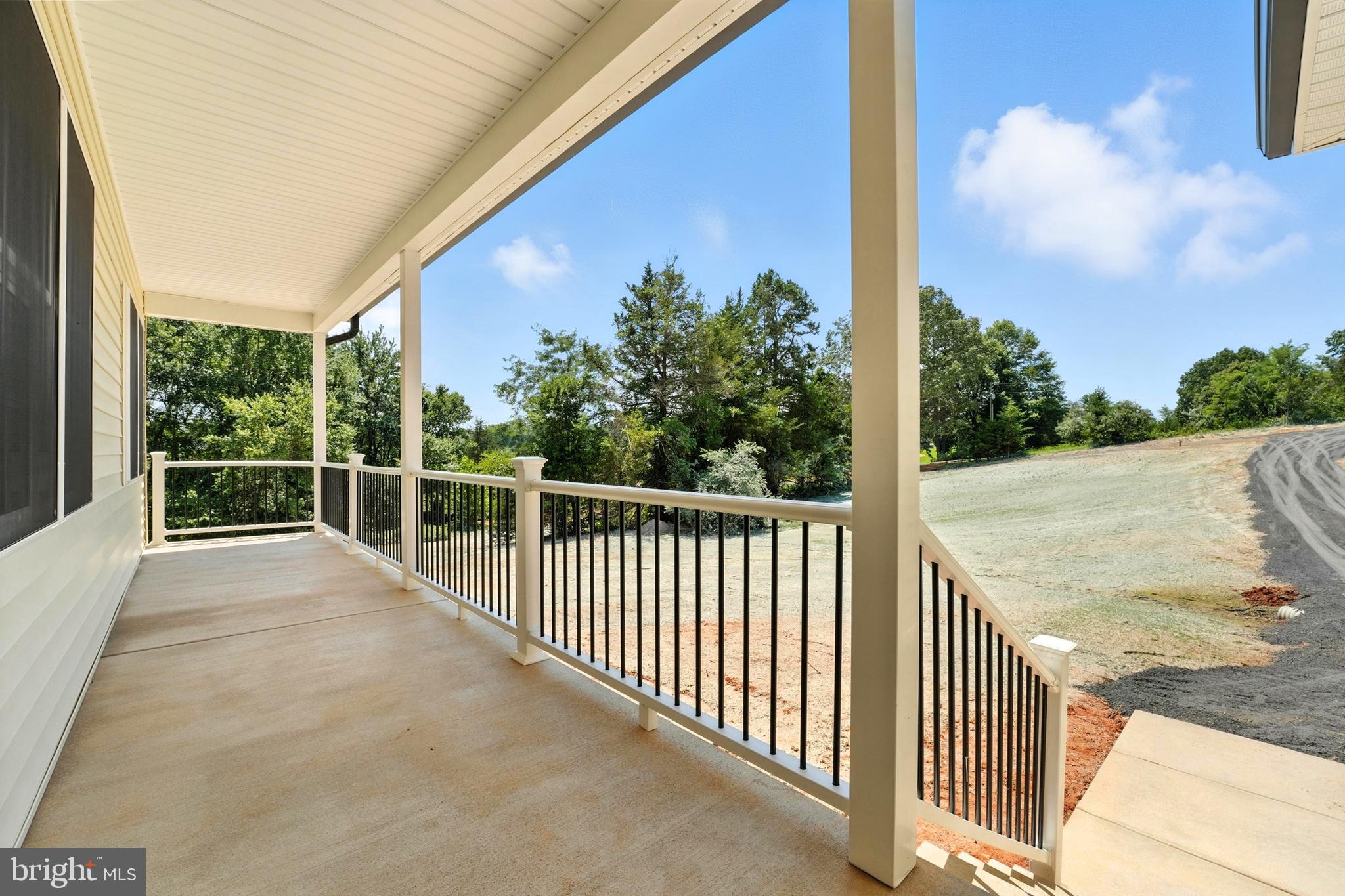 10446 Cherry Hill Road Culpeper, VA 22701 - Photo 49 of 53 a view of a balcony with trees