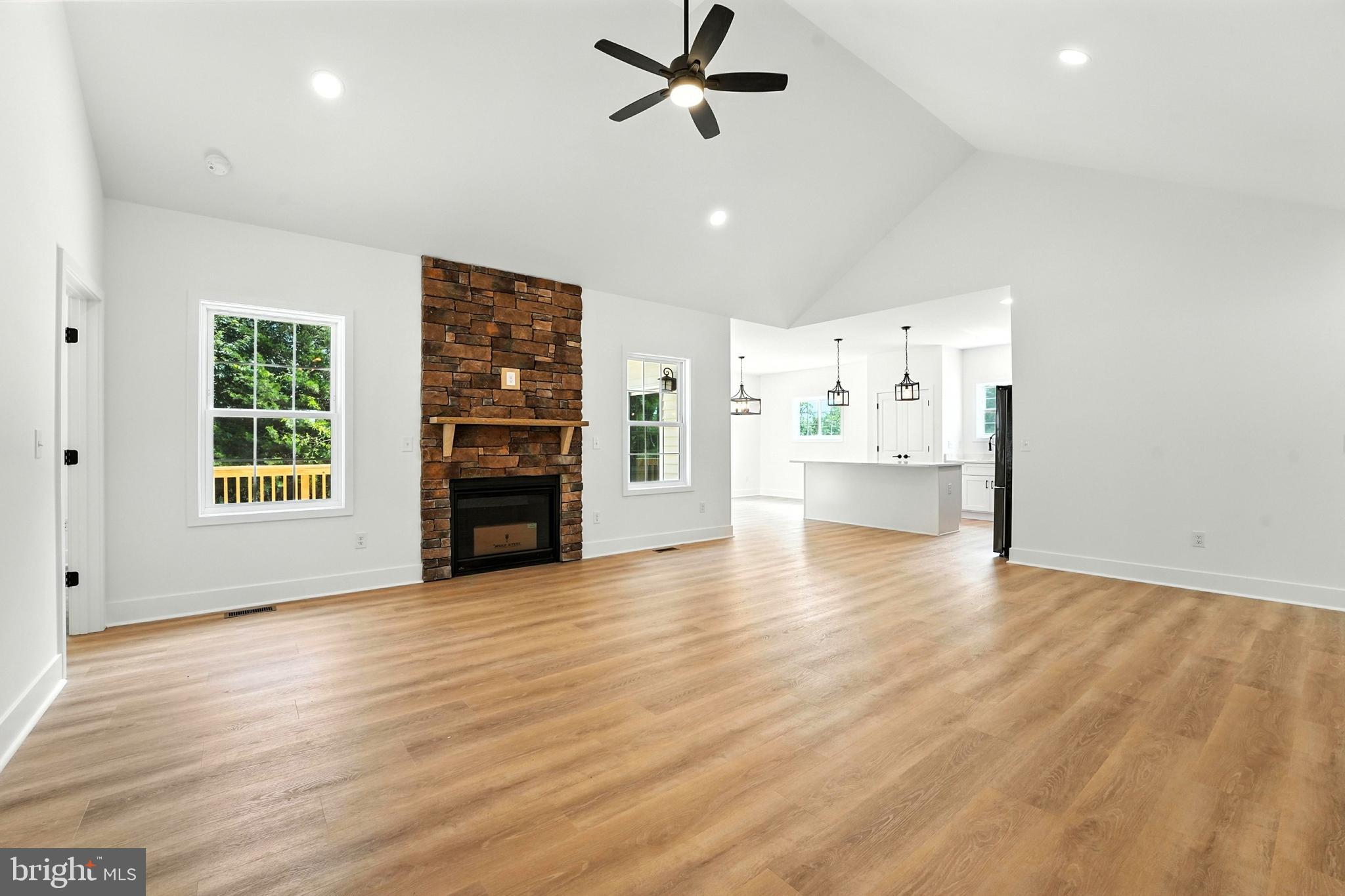 10446 Cherry Hill Road Culpeper, VA 22701 - Photo 6 of 53 a view of empty room with wooden floor and windows
