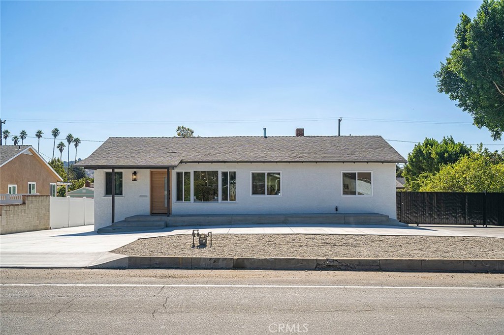 732 East Foothill Boulevard Glendora, CA 91741 - Photo 1 of 61 a front view of a house with a yard