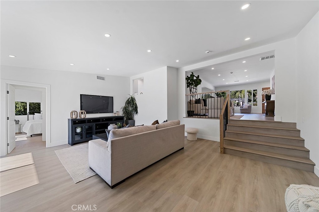 732 East Foothill Boulevard Glendora, CA 91741 - Photo 20 of 61 a living room with furniture and a flat screen tv