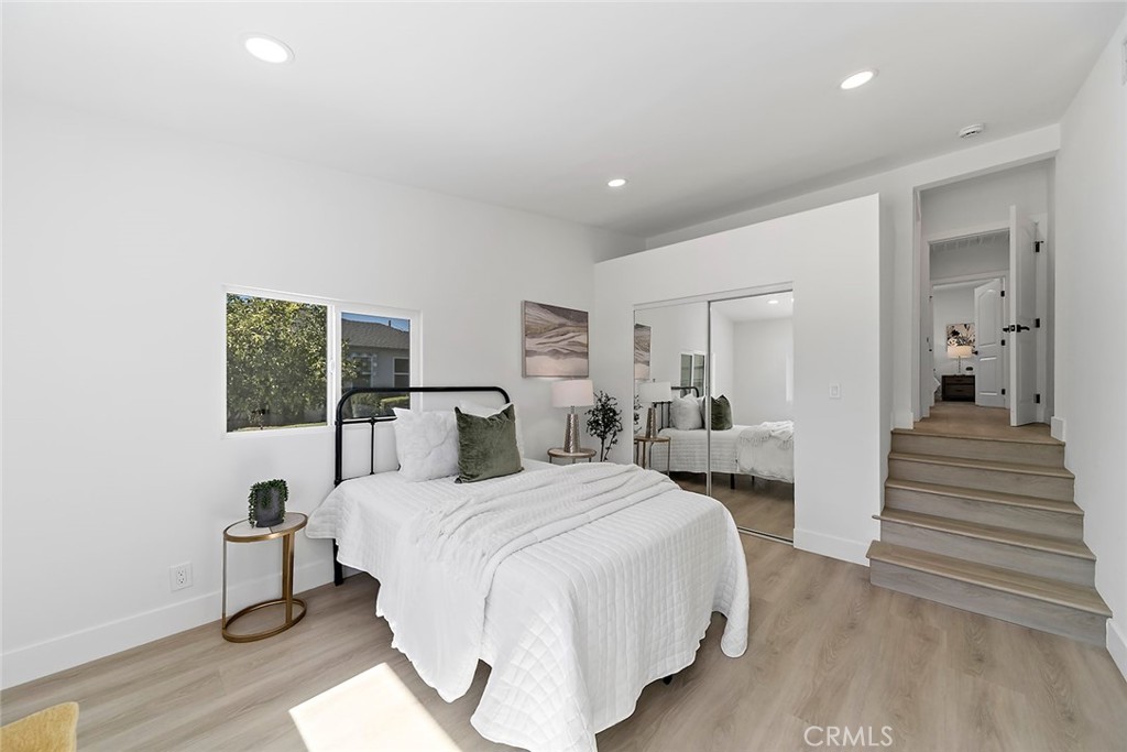 732 East Foothill Boulevard Glendora, CA 91741 - Photo 28 of 61 a bedroom with a bed and a large window