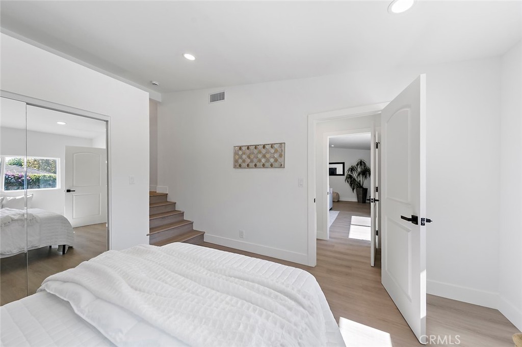 732 East Foothill Boulevard Glendora, CA 91741 - Photo 31 of 61 a bedroom with a bed and a view of living room