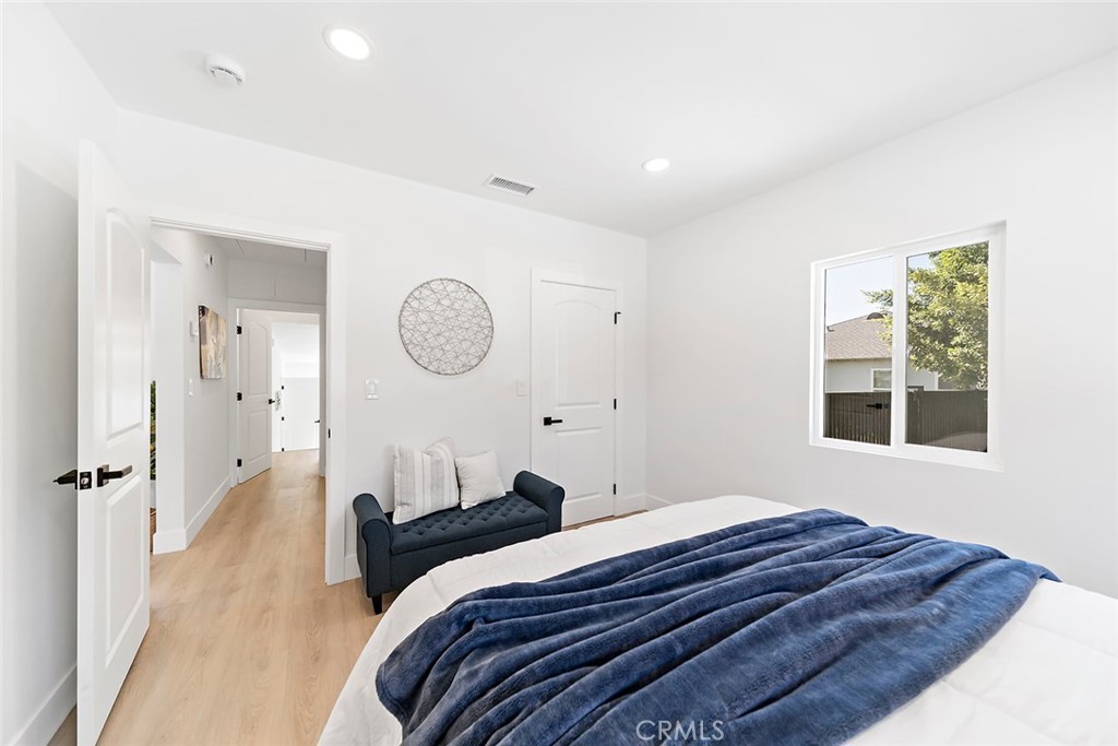 732 East Foothill Boulevard Glendora, CA 91741 - Photo 39 of 61 a bedroom with a bed and a window