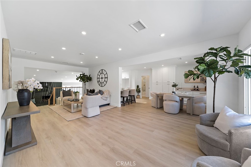 732 East Foothill Boulevard Glendora, CA 91741 - Photo 4 of 61 a living room with furniture and potted plant