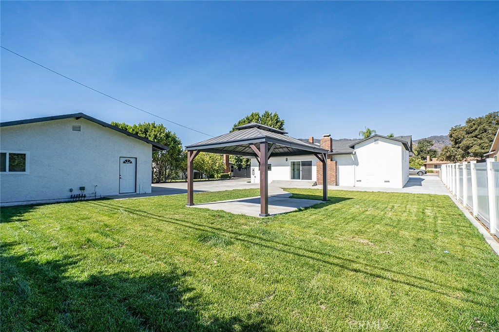 732 East Foothill Boulevard Glendora, CA 91741 - Photo 47 of 61 a house with garden in front of it