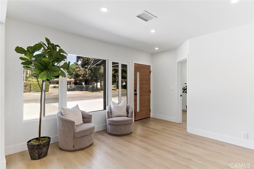 732 East Foothill Boulevard Glendora, CA 91741 - Photo 5 of 61 a living room with furniture and a potted plant
