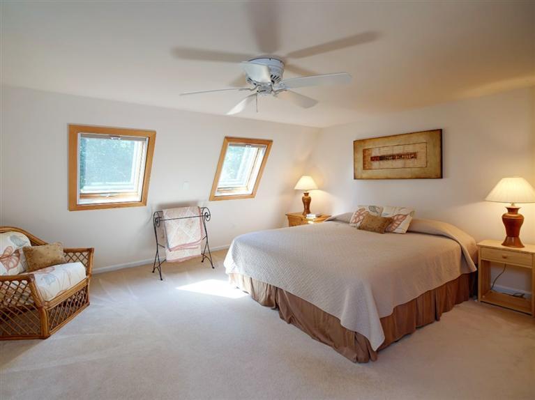 35 Quaker Road Falmouth, MA 02540 - Photo 14 of 22 a spacious bedroom with a bed and window