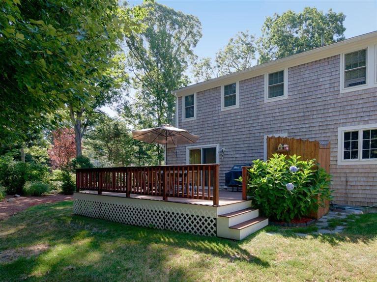 35 Quaker Road Falmouth, MA 02540 - Photo 17 of 22 a view of a house with a yard