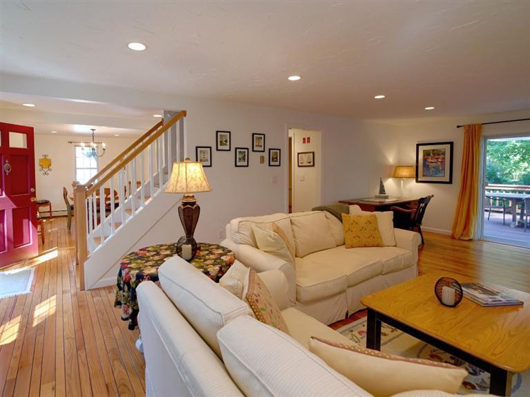 35 Quaker Road Falmouth, MA 02540 - Photo 4 of 22 a living room with furniture and wooden floor
