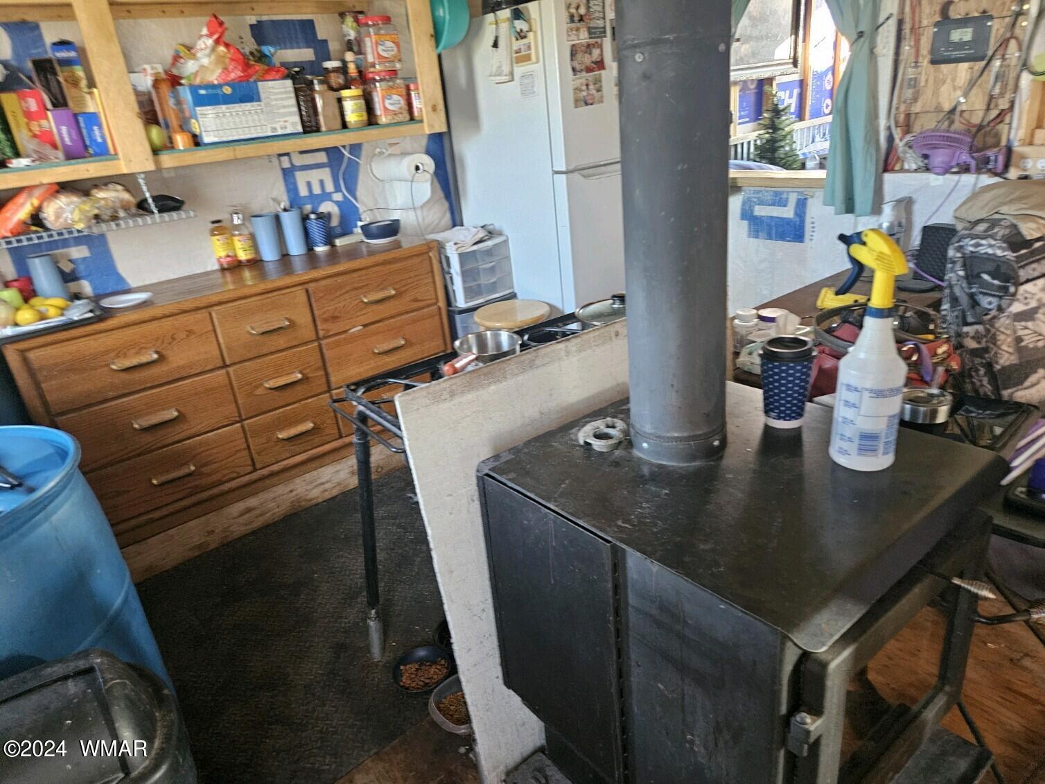110 County Road Concho, AZ 85924 - Photo 19 of 21 a kitchen with a refrigerator and a sink