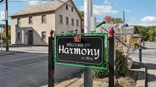 a sign on the side of a street