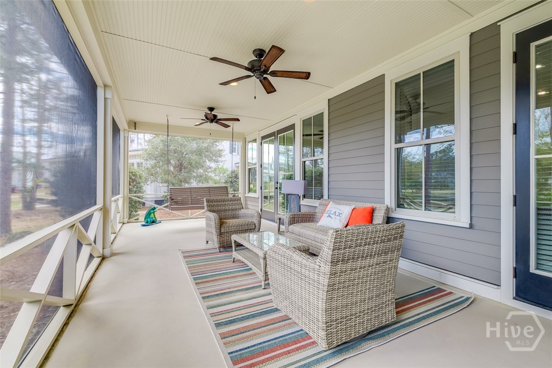 36 Oldfield Village Road Bluffton, SC 29909 - Photo 39 of 74 Enormous 36.3'x11.8' screened porch with swing