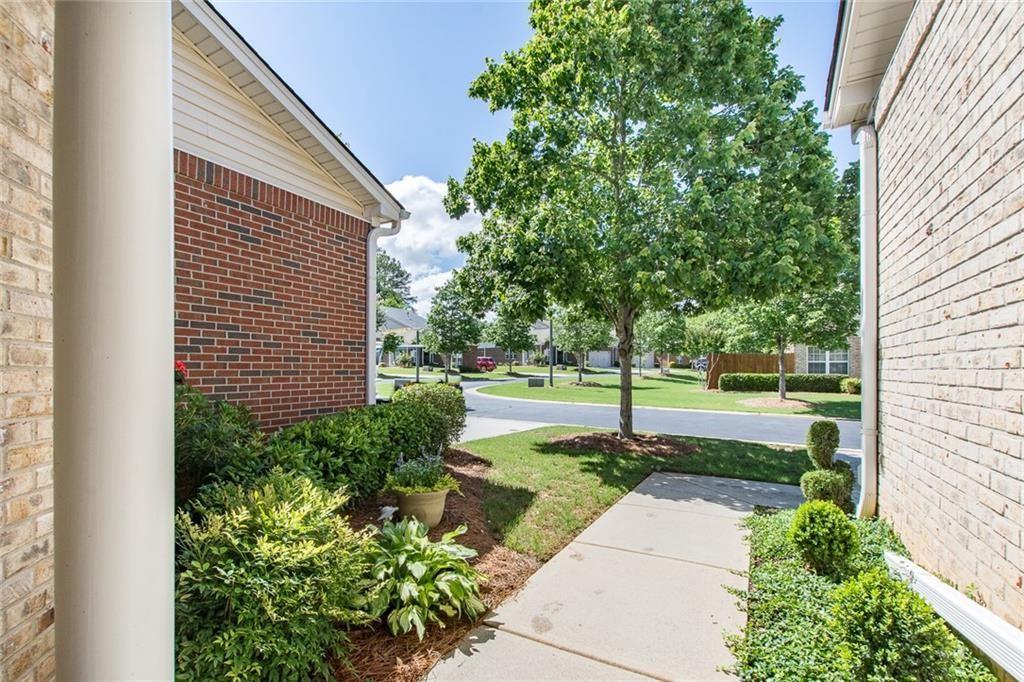 3916 Abbott Way Southwest, Unit 2 Powder Springs, GA 30127 - Photo 3 of 37 a view of a garden with pathway
