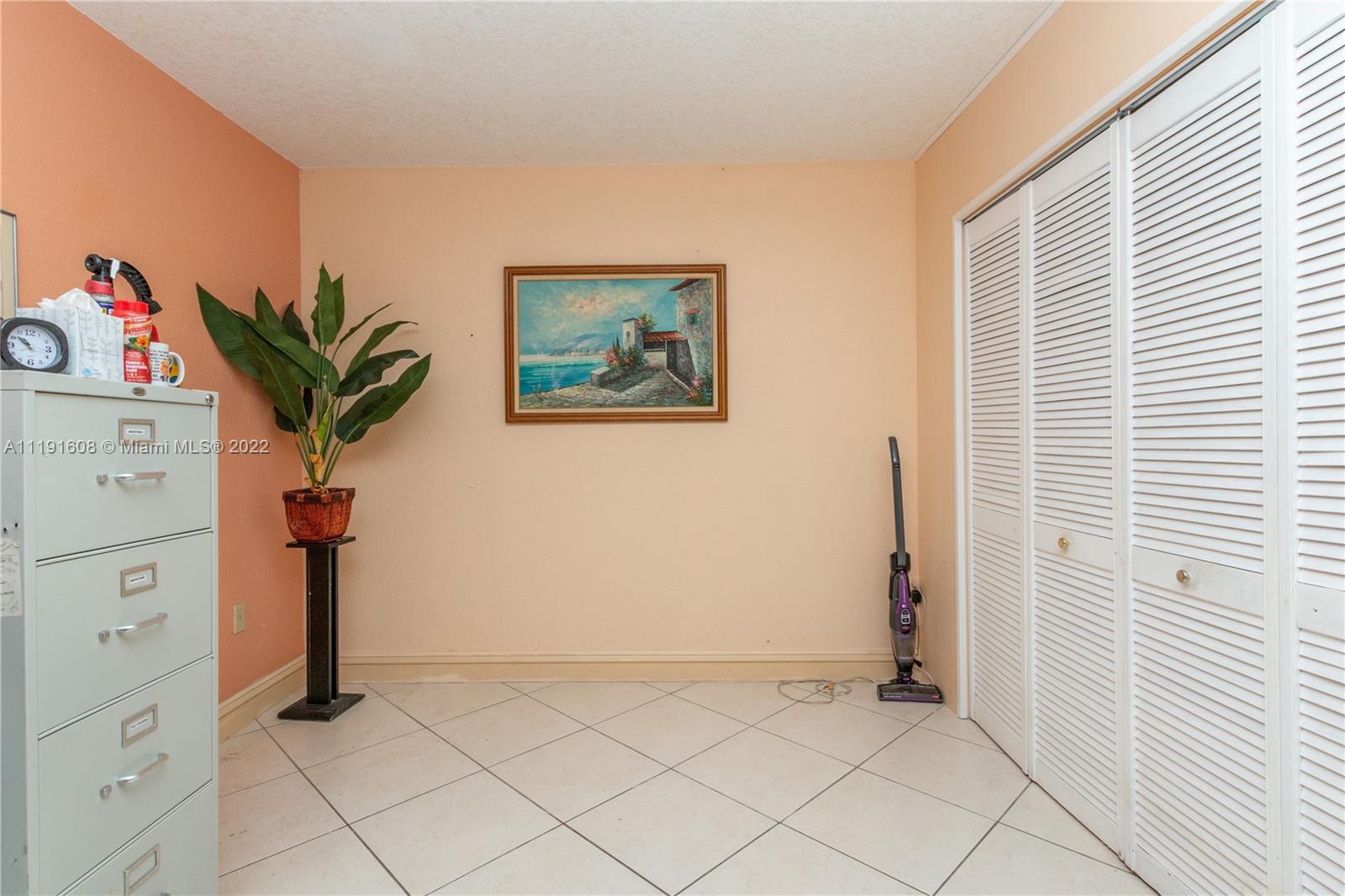 13560 Southwest 2nd Street Miami, FL 33184 - Photo 39 of 50 a view of a hallway with workspace