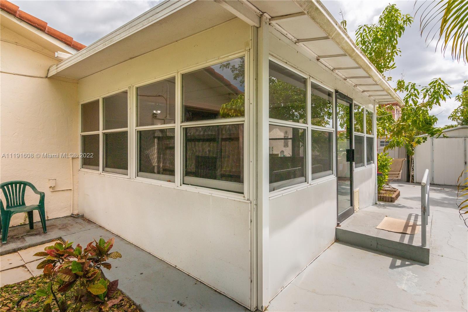 13560 Southwest 2nd Street Miami, FL 33184 - Photo 47 of 50 a view of a house with a large window