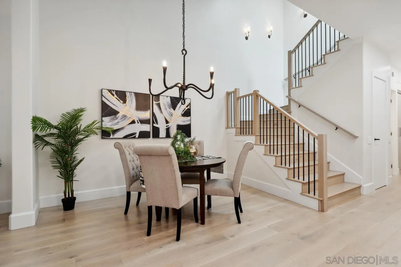 15345 Via Simpatico Rancho Santa Fe, CA 92091 - Photo 36 of 75 a view of a dining room with furniture and wooden floor