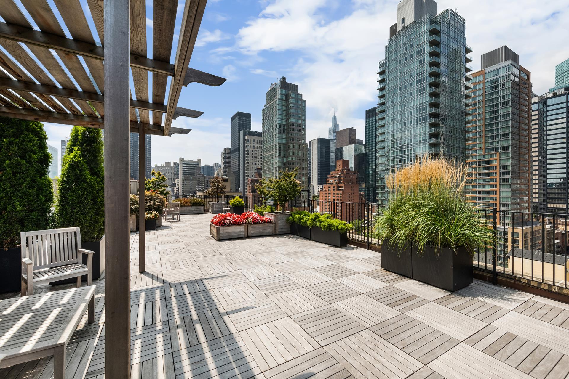 333 East 53rd Street, Unit 6B Manhattan, NY 10022 - Photo 11 of 15 a view of a city with tall buildings