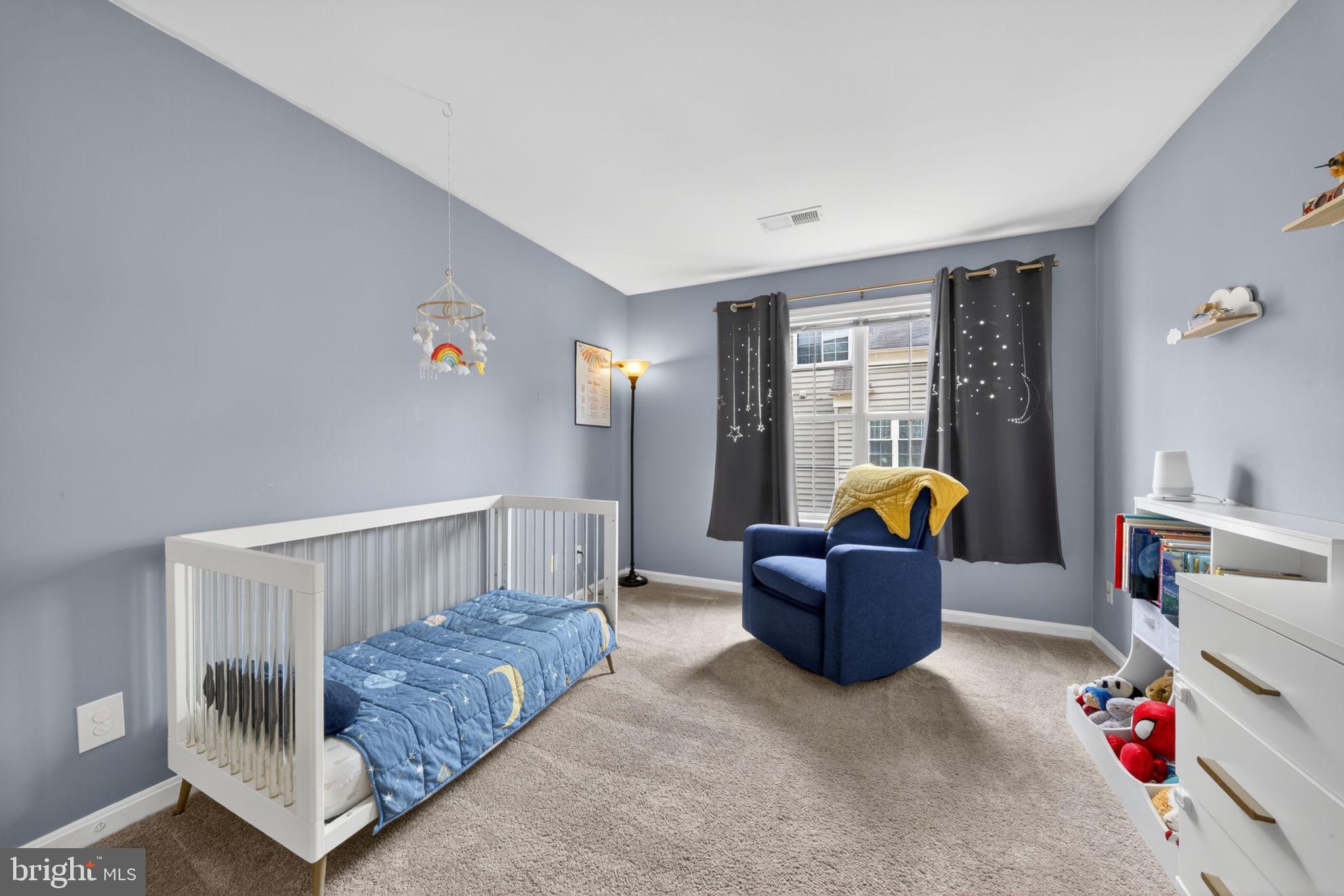 6006 Lincolnia Road Alexandria, VA 22312 - Photo 18 of 42 Serene nursery with calming hues.