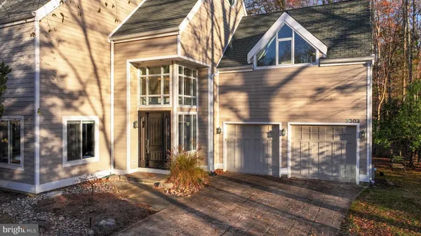 a view of a brick house with a large windows