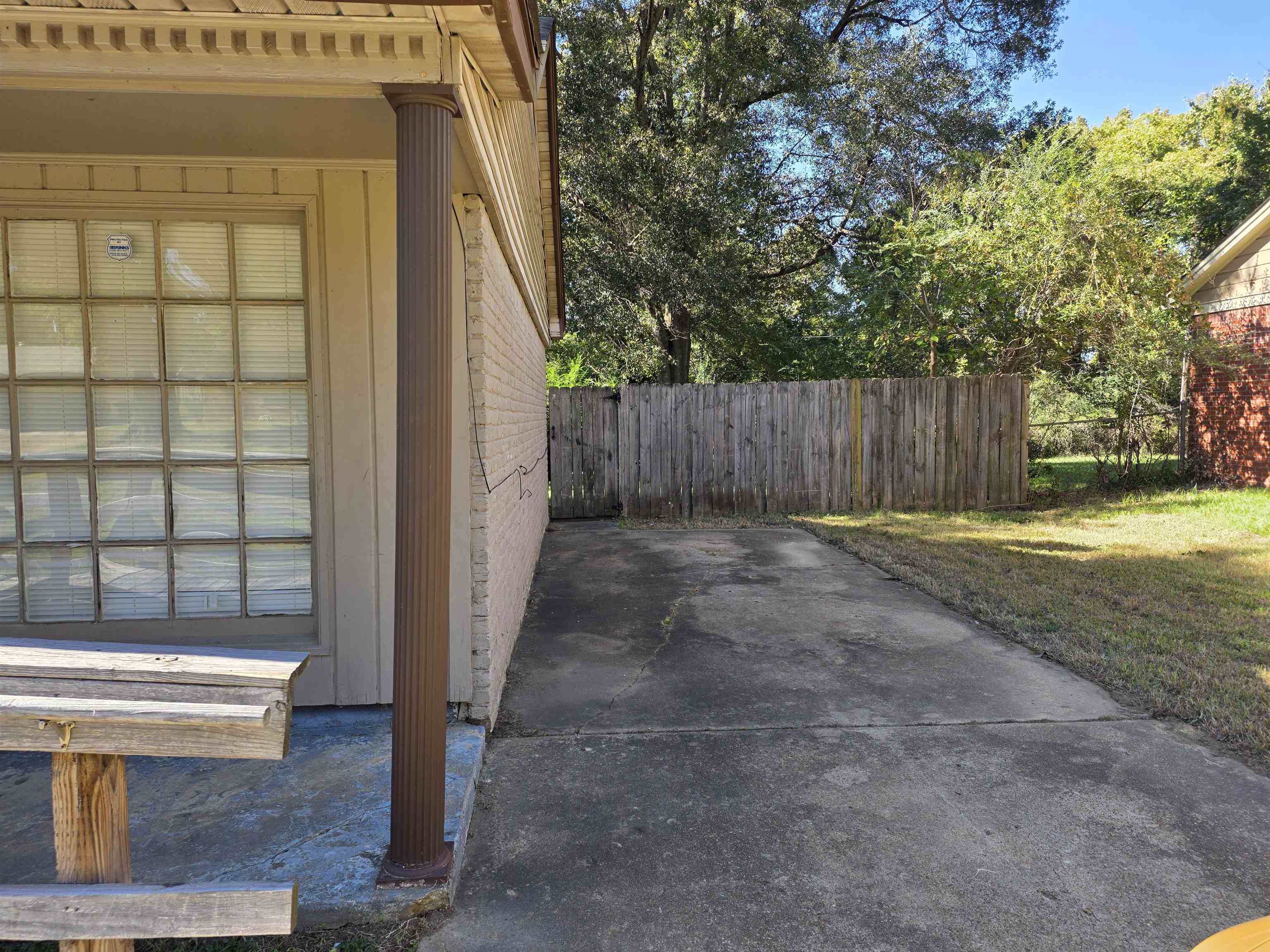 4573 Appleville Street Memphis, TN 38109 - Photo 3 of 22 a view of outdoor space with sliding door and wooden floor