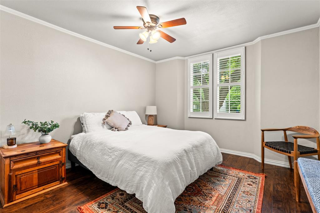 3116 Alexander Avenue Waco, TX 76708 - Photo 23 of 40 a bedroom with a bed and wooden floor