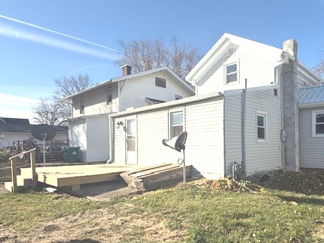406 South Division Avenue Polo, IL 61064 - Photo 12 of 13 a view of a house with a snow in the yard