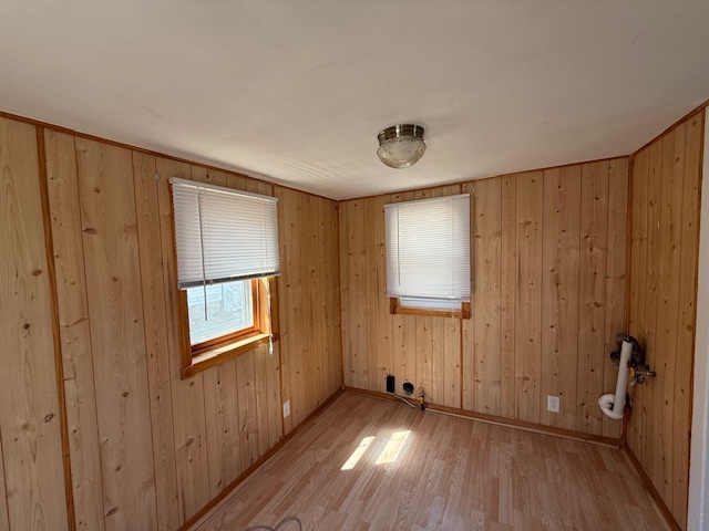 406 South Division Avenue Polo, IL 61064 - Photo 10 of 13 a view of an empty room with wooden floor and a window