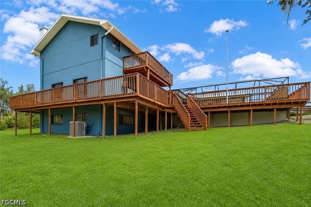 27255 Hickory Hill Road Brooksville, FL 34602 - Photo 18 of 50 a view of a house with roof deck